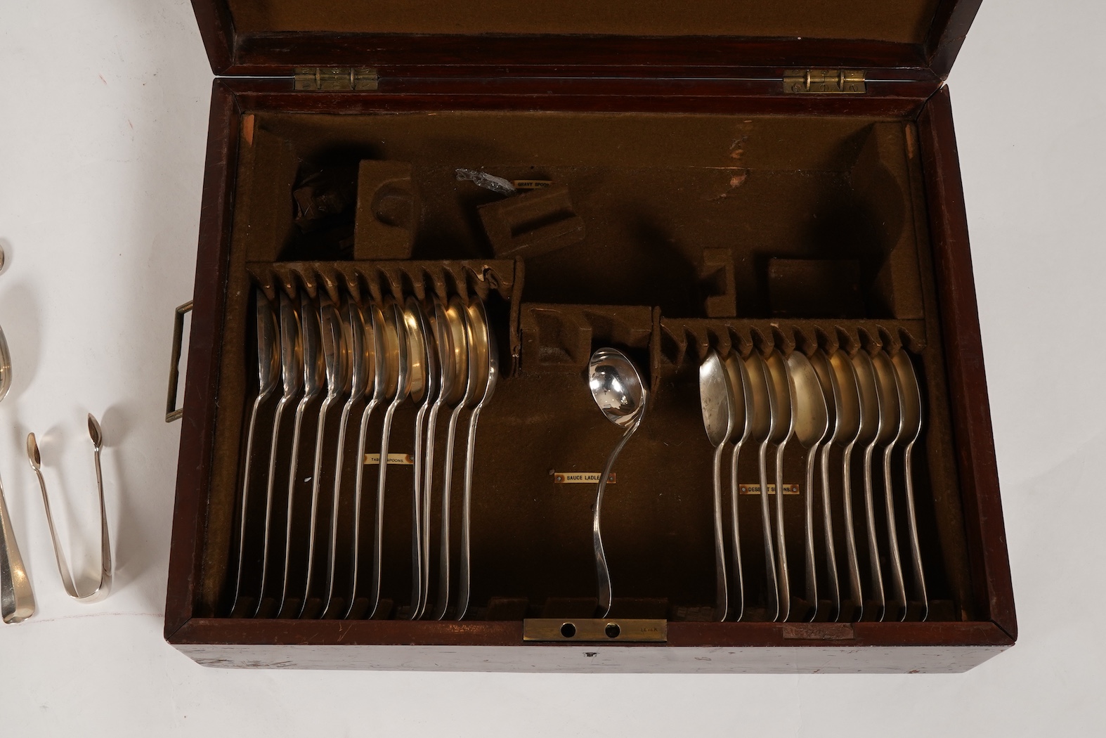 A George V canteen of silver Hanoverian rat tail flatware, by Mappin & Webb